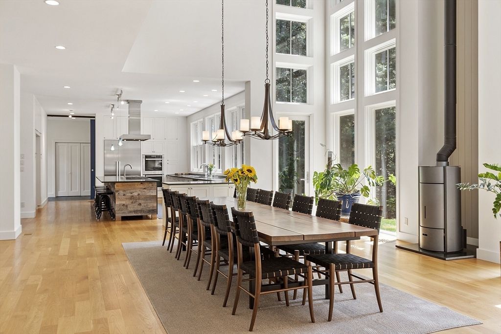 Chandelier, Dining room, Interior, Kitchen, Pendant Lights, Recessed Lighting, Stainless Steel Appliances, Wood Texture Flooring