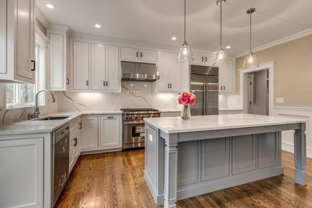 Interior, Kitchen, Marble Walls, Pendant Lights, Recessed Lighting, Stainless Steel Appliances, Wood Texture Flooring