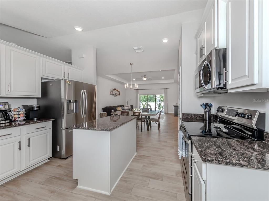 Dining room, Interior, Kitchen, Pendant Lights, Recessed Lighting, Wood Texture Flooring
