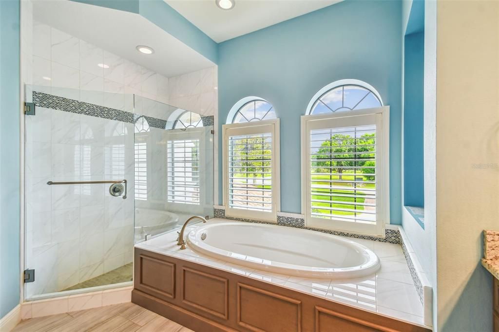 Bathroom, Glass Shower, Interior, Marble Walls, Recessed Lighting, Tile Countertops, Wood Texture Flooring