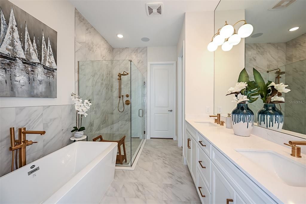 Bathroom, Dual Sink Vanities, Free Standing Baths, Glass Shower, Interior, Marble, Marble Walls, Recessed Lighting