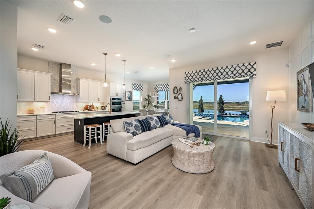 Interior, Kitchen, Living room, Pendant Lights, Recessed Lighting, Stainless Steel Appliances, Water, Wood Texture Flooring