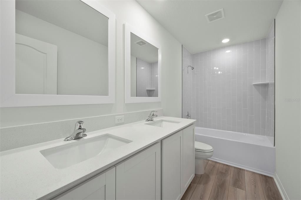 Bathroom, Dual Sink Vanities, Interior, Recessed Lighting, Wood Texture Flooring