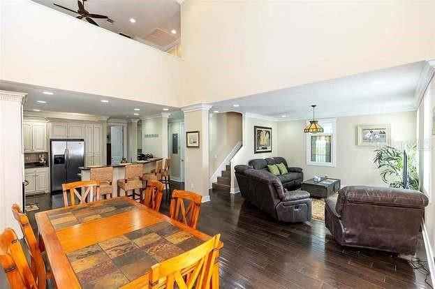 Dining room, Interior, Kitchen, Living room, Pendant Lights, Recessed Lighting, Stainless Steel Appliances, Wood Texture Flooring