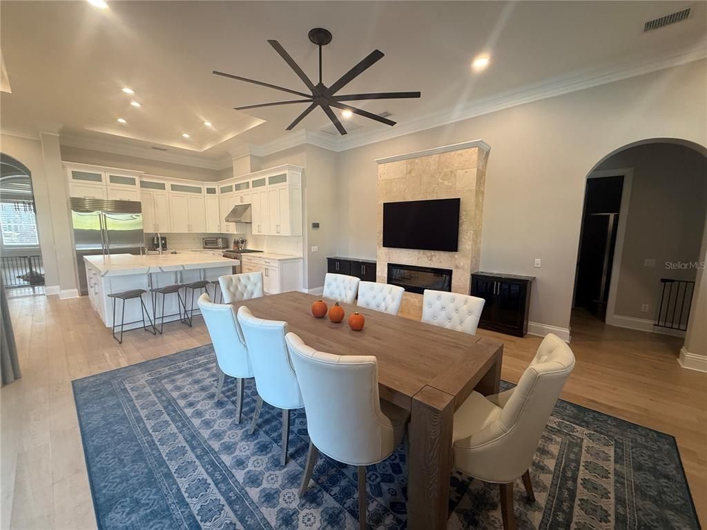 Dining room, Interior, Kitchen, Pendant Lights, Recessed Lighting, Stainless Steel Appliances, Wood Texture Flooring