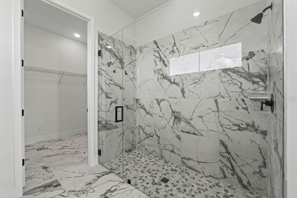 Bathroom, Glass Shower, Interior, Marble, Marble Walls, Recessed Lighting, Walk-in Closets