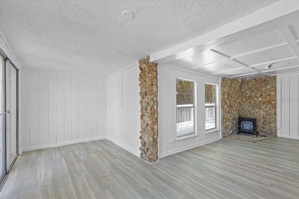Empty room, Fireplace, Interior, Stone Walls, Wood Texture Flooring