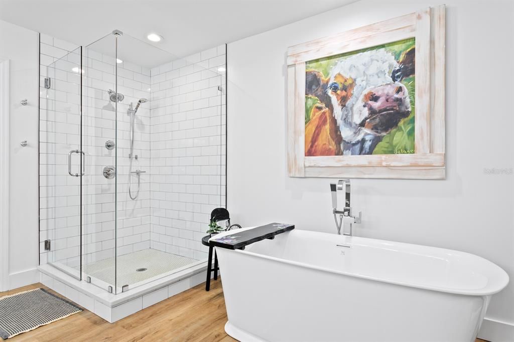 Bathroom, Free Standing Baths, Glass Shower, Interior, Recessed Lighting, Wood Texture Flooring