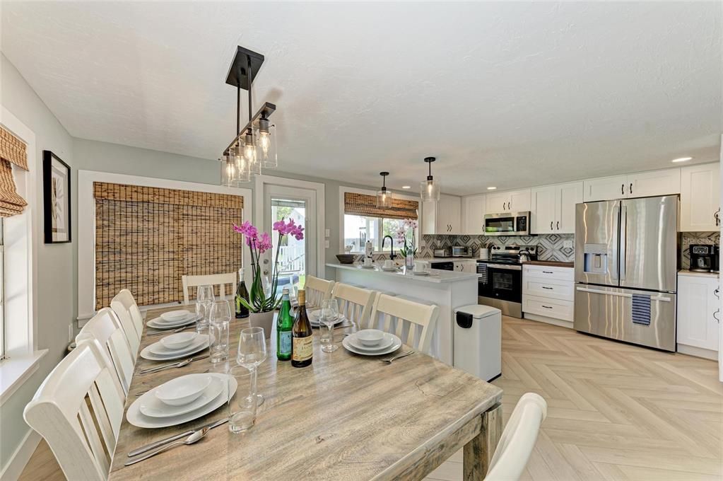 Dining room, Interior, Kitchen, Pendant Lights, Recessed Lighting, Stainless Steel Appliances, Wood Texture Flooring