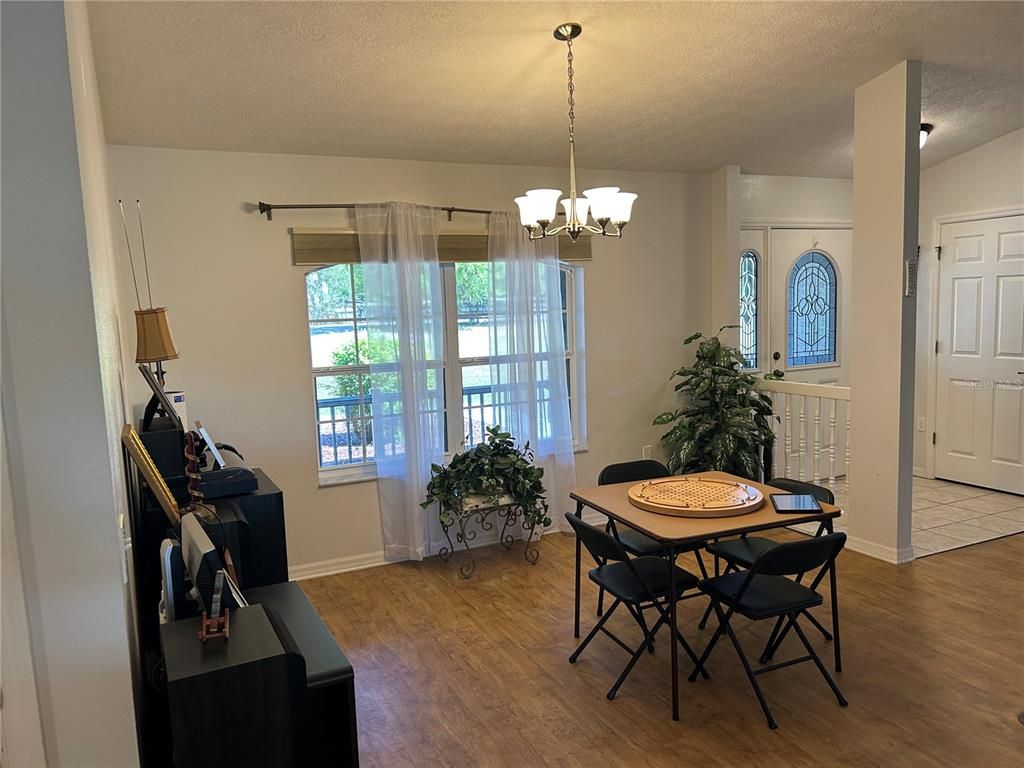 Chandelier, Dining room, Interior, Wood Texture Flooring