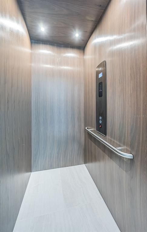 Elevator, Interior, Recessed Lighting, Wooden Ceilings, Wooden Walls
