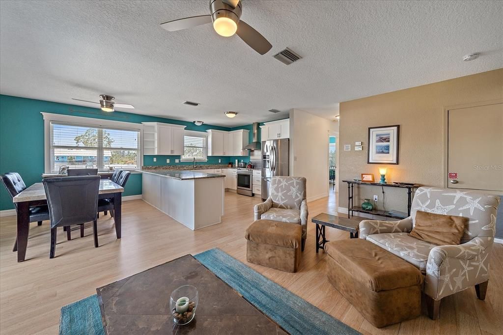 Dining room, Interior, Kitchen, Living room, Stainless Steel Appliances, Wood Texture Flooring