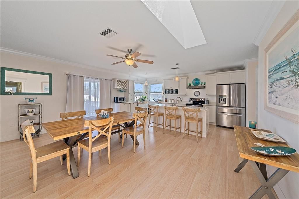 Dining room, Interior, Kitchen, Pendant Lights, Stainless Steel Appliances, Wood Texture Flooring