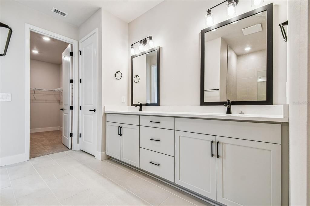 Bathroom, Dual Sink Vanities, Interior, Recessed Lighting, Walk-in Closets