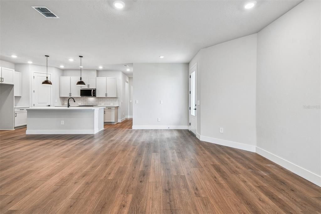 Empty room, Interior, Kitchen, Pendant Lights, Recessed Lighting, Wood Texture Flooring