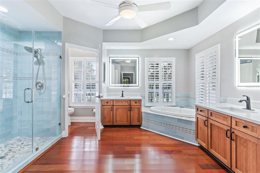 Bathroom, Dual Sink Vanities, Glass Shower, Interior, Recessed Lighting, Wood Texture Flooring