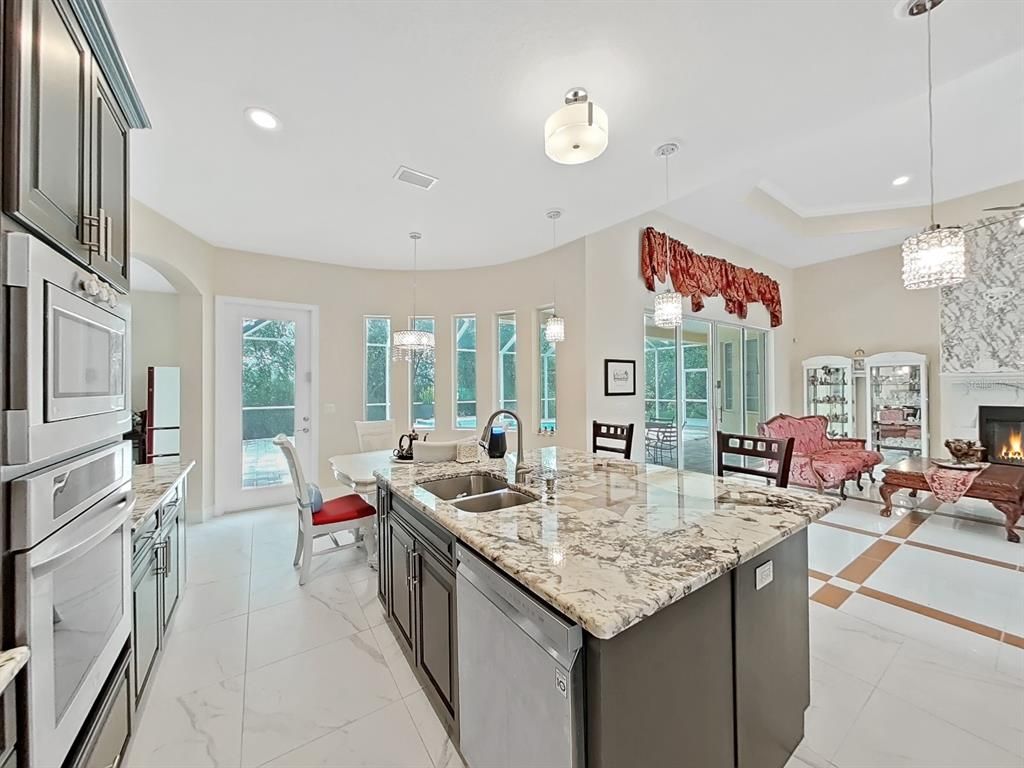 Chandelier, Dining room, Fireplace, Interior, Kitchen, Living room, Marble, Pendant Lights, Recessed Lighting