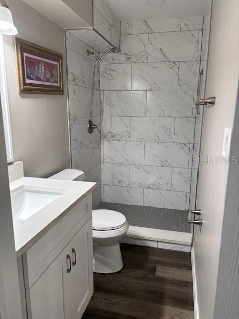Bathroom, Glass Shower, Interior, Marble Walls, Wood Texture Flooring