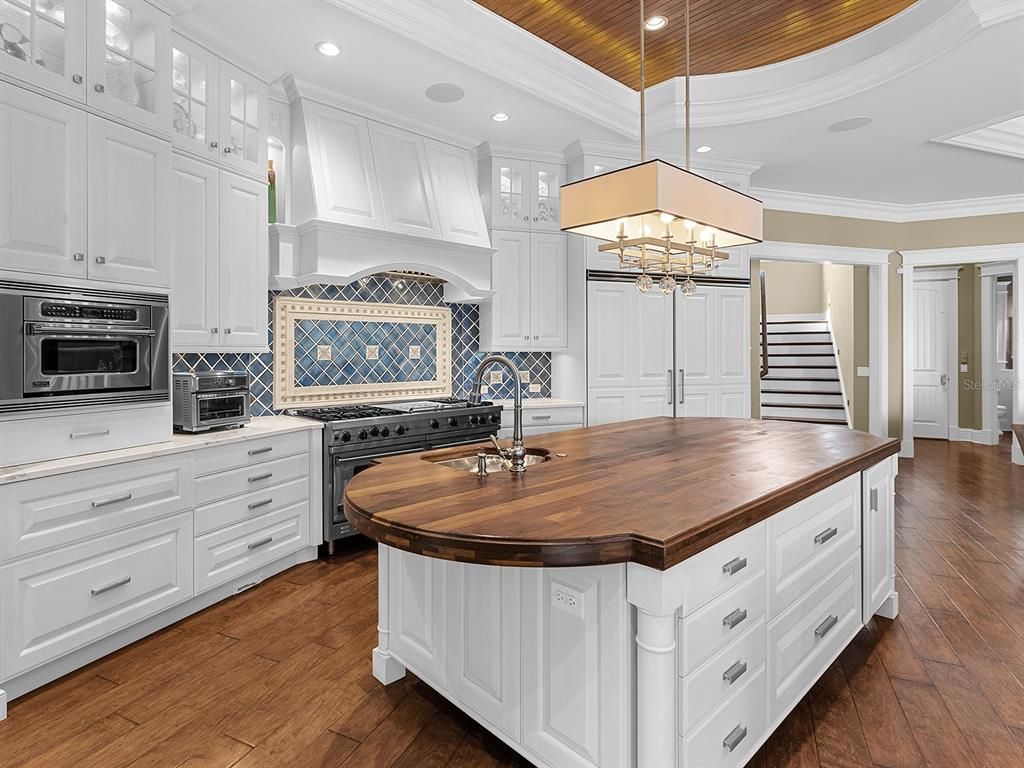 Chandelier, Interior, Kitchen, Pendant Lights, Recessed Lighting, Stainless Steel Appliances, Wooden Ceilings, Wood Texture Flooring