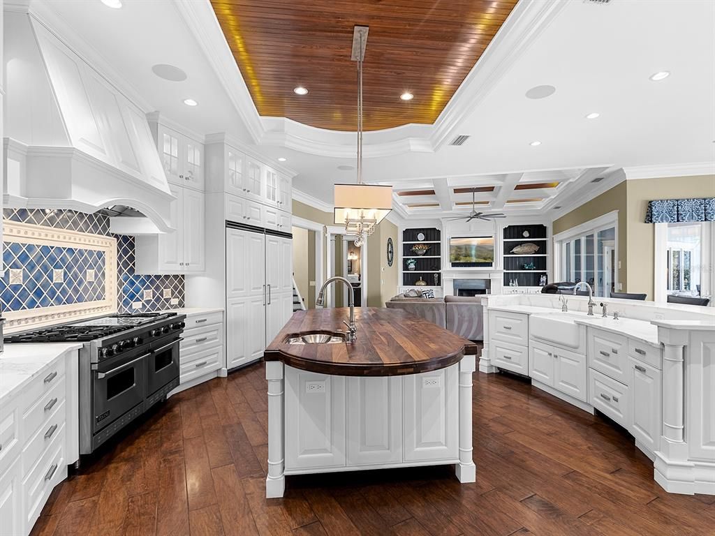 Chandelier, Interior, Kitchen, Pendant Lights, Recessed Lighting, Stainless Steel Appliances, Wooden Ceilings, Wood Texture Flooring