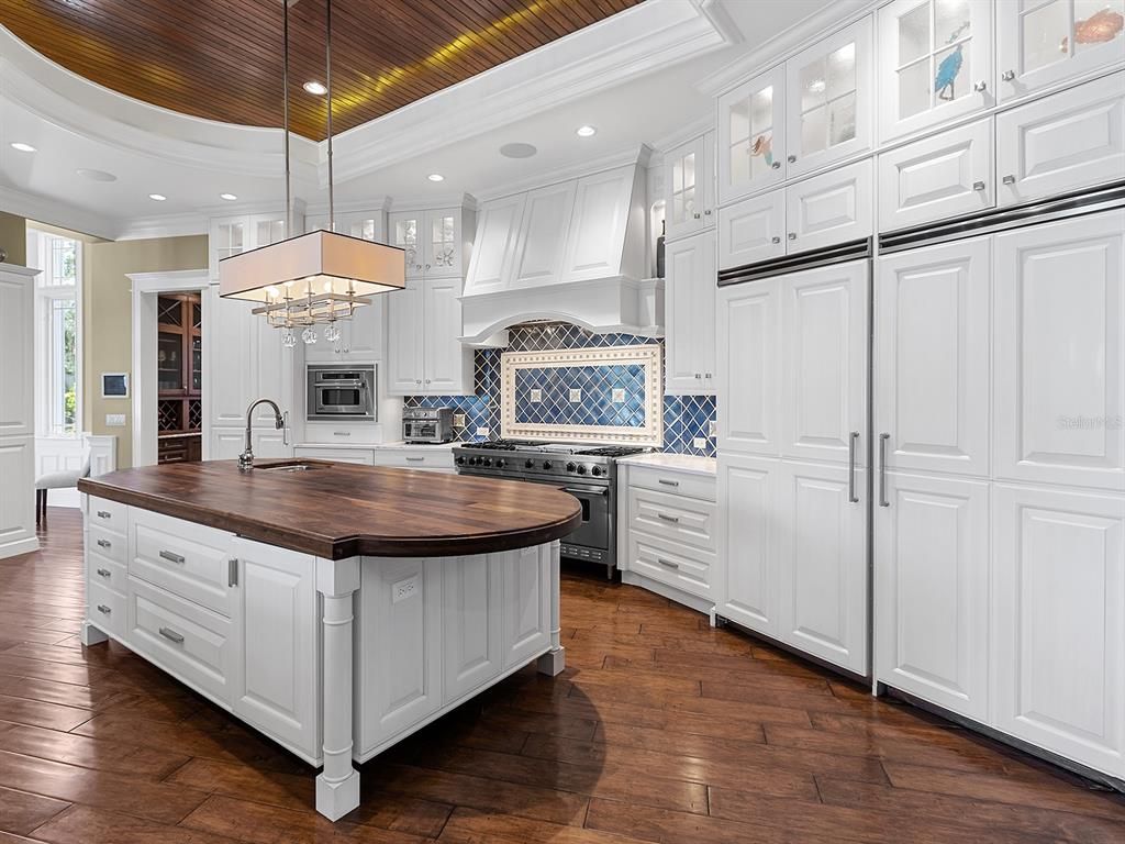 Chandelier, Interior, Kitchen, Pendant Lights, Recessed Lighting, Stainless Steel Appliances, Wooden Ceilings, Wood Texture Flooring