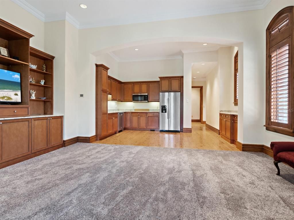Empty room, Interior, Kitchen, Recessed Lighting, Stainless Steel Appliances, Wood Texture Flooring