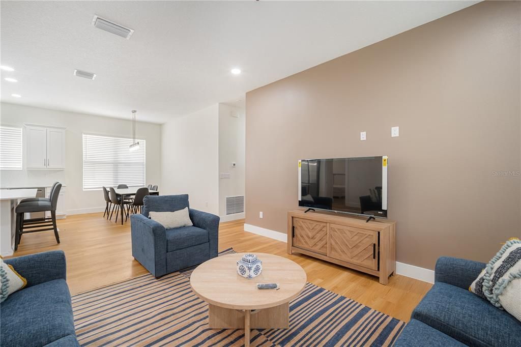 Dining room, Interior, Living room, Pendant Lights, Recessed Lighting, Wood Texture Flooring