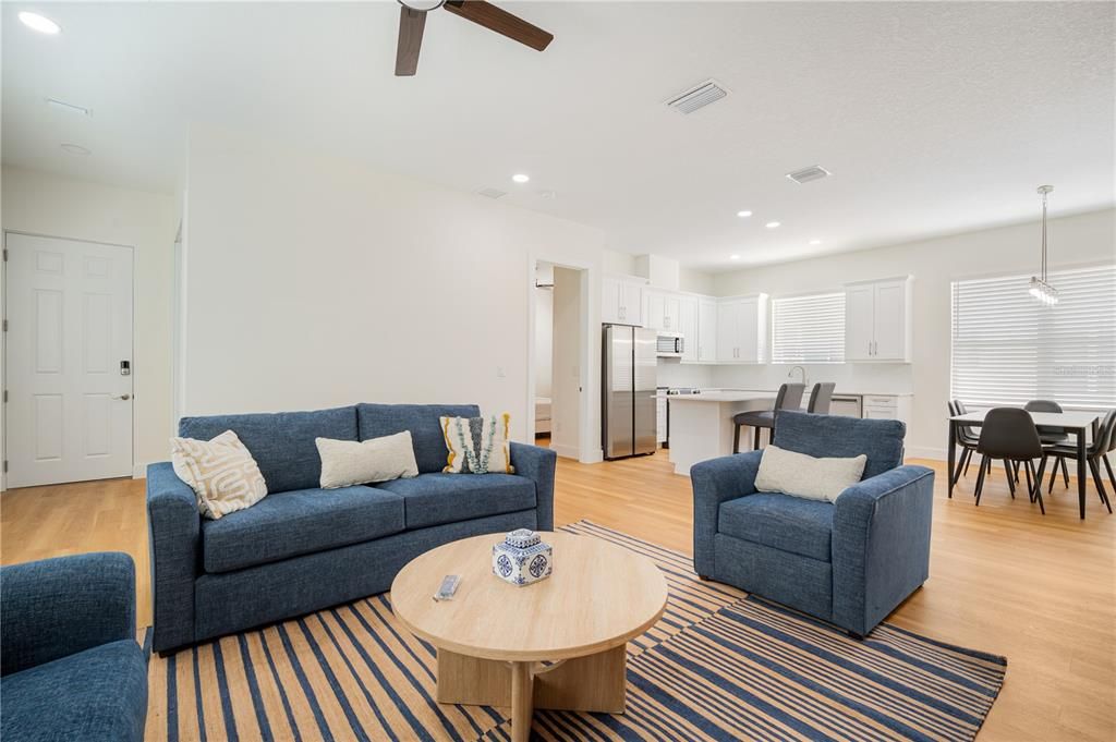 Dining room, Interior, Kitchen, Living room, Pendant Lights, Recessed Lighting, Stainless Steel Appliances, Wood Texture Flooring