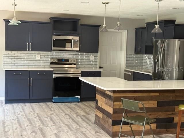 Interior, Kitchen, Pendant Lights, Stainless Steel Appliances, Wood Texture Flooring