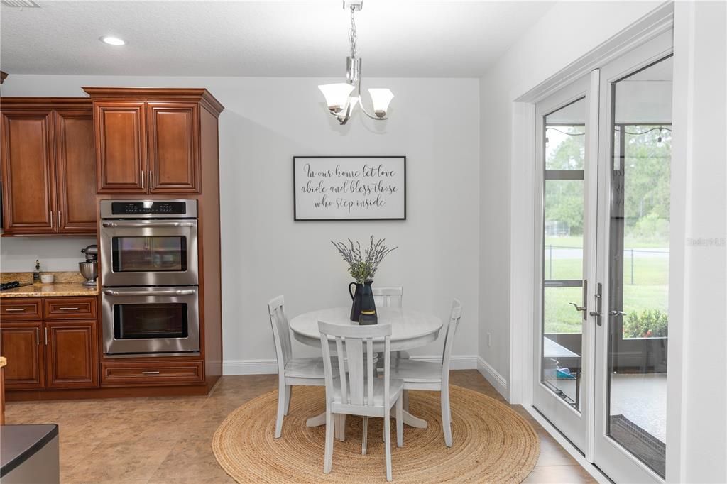 Chandelier, Dining room, Interior, Kitchen, Pendant Lights, Recessed Lighting, Stainless Steel Appliances