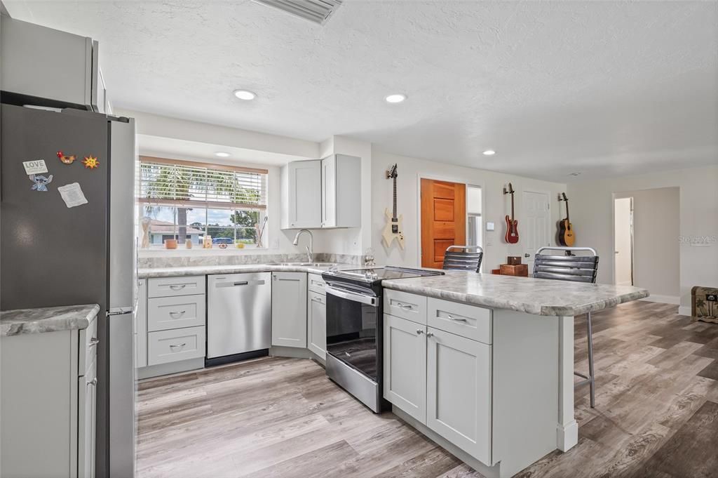 Interior, Kitchen, Recessed Lighting, Stainless Steel Appliances, Wood Texture Flooring