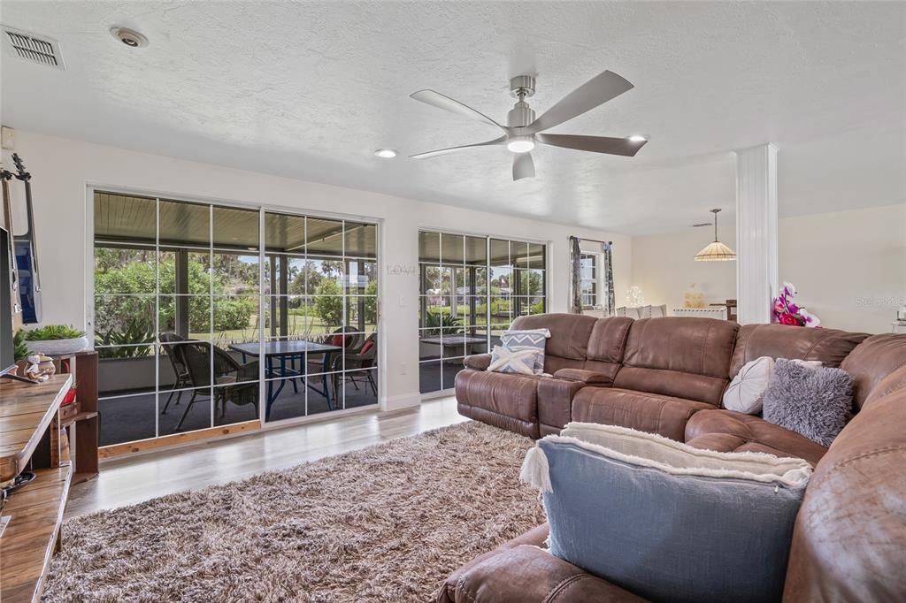 Dining room, Interior, Living room, Pendant Lights, Recessed Lighting, Wood Texture Flooring
