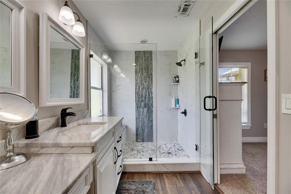 Bathroom, Glass Shower, Interior, Marble Walls, Wood Texture Flooring