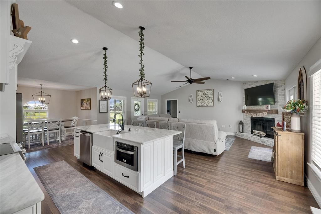 Dining room, Fireplace, Interior, Kitchen, Living room, Pendant Lights, Recessed Lighting, Wood Texture Flooring