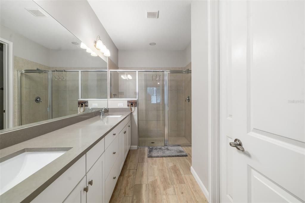 Bathroom, Dual Sink Vanities, Glass Shower, Interior, Wood Texture Flooring