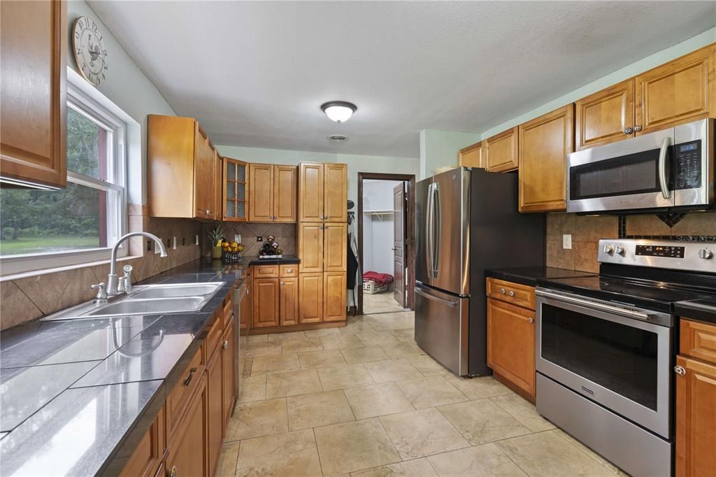 Interior, Kitchen, Stainless Steel Appliances, Tile Countertops