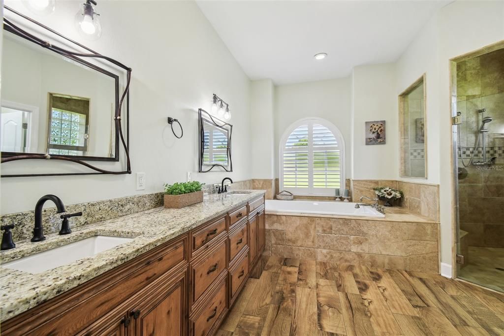 Bathroom, Dual Sink Vanities, Glass Shower, Interior, Recessed Lighting, Wood Texture Flooring