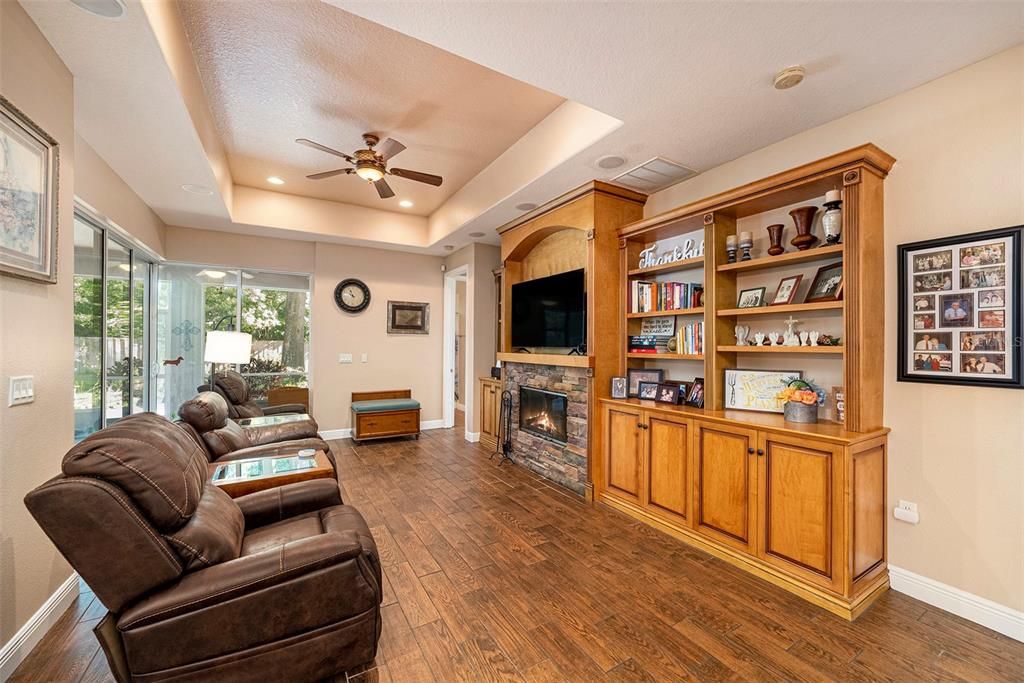 Fireplace, Interior, Living room, Recessed Lighting, Wood Texture Flooring