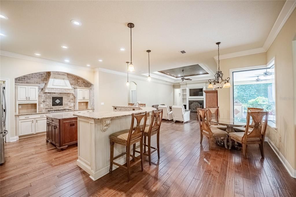 Dining room, Fireplace, Interior, Kitchen, Living room, Pendant Lights, Recessed Lighting, Stone Walls, Wood Texture Flooring