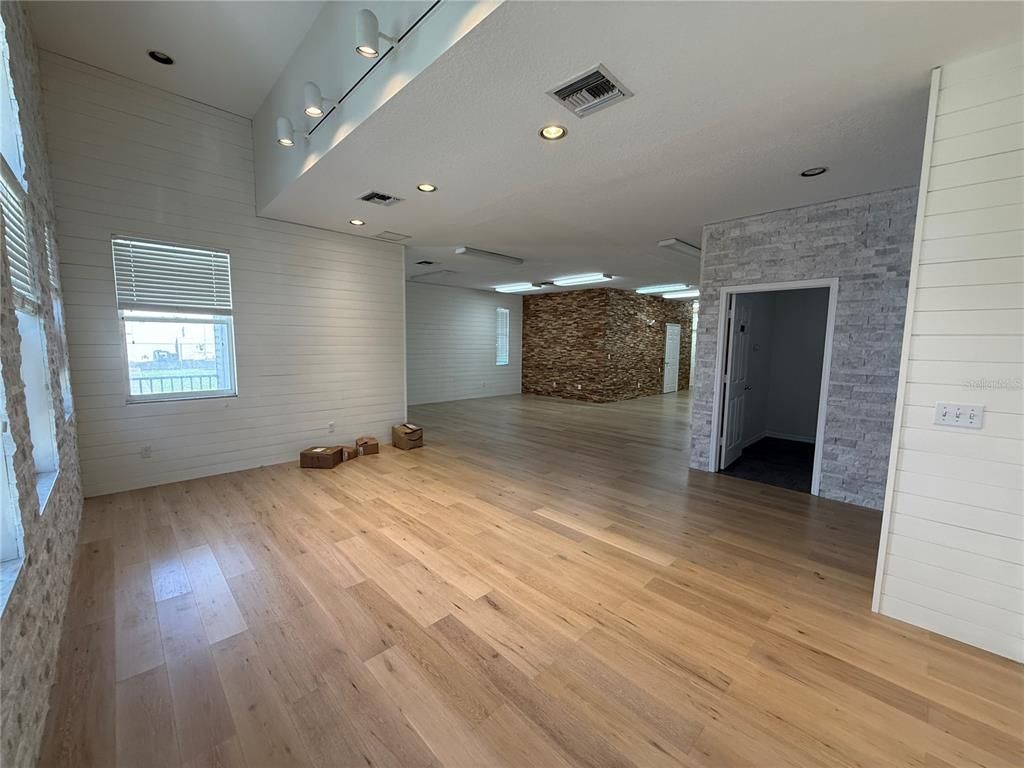 Empty room, Interior, Recessed Lighting, Stone Walls, Wood Texture Flooring