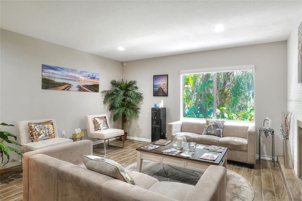 Fireplace, Interior, Living room, Recessed Lighting, Wood Texture Flooring