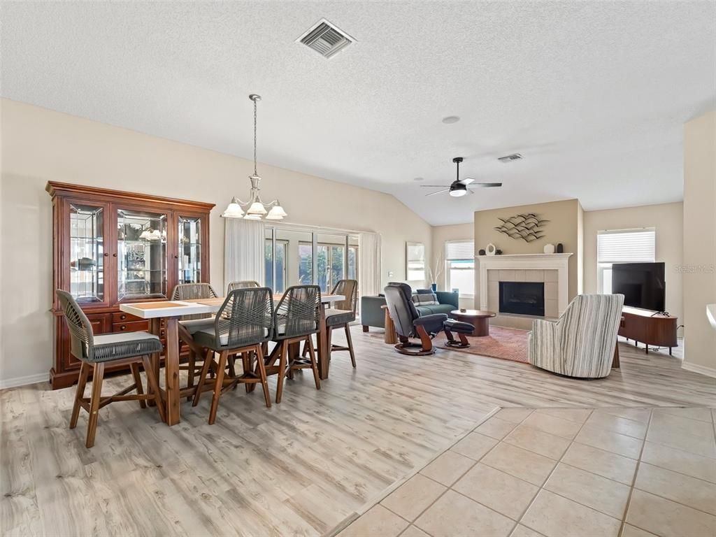 Dining room, Fireplace, Interior, Living room, Pendant Lights, Wood Texture Flooring