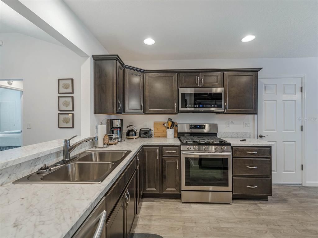 Interior, Kitchen, Recessed Lighting, Stainless Steel Appliances, Wood Texture Flooring