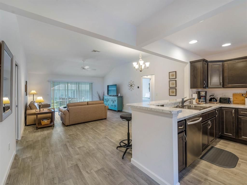 Chandelier, Interior, Kitchen, Living room, Recessed Lighting, Wood Texture Flooring