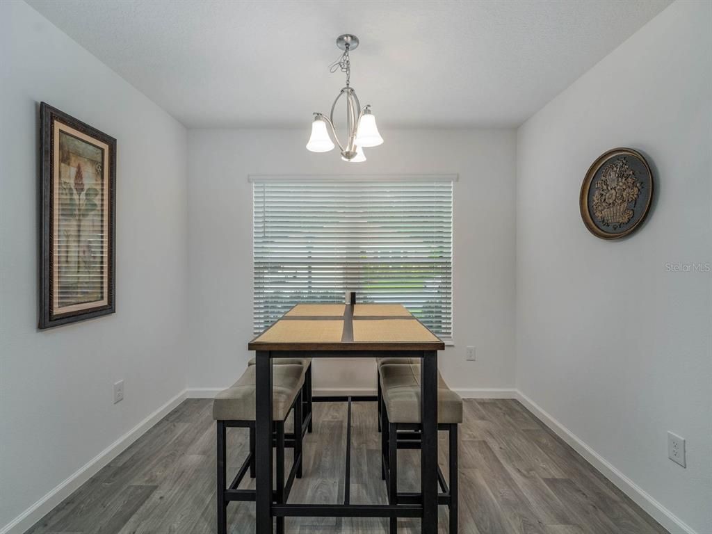 Chandelier, Dining room, Interior, Pendant Lights, Wood Texture Flooring
