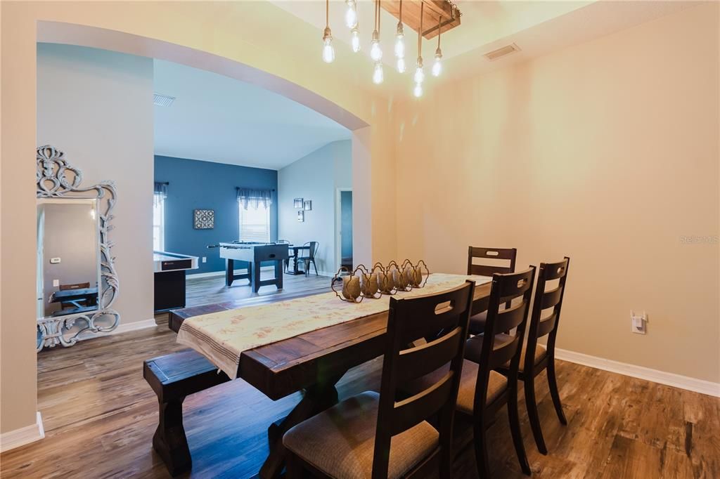 Dining room, Game Room, Interior, Pendant Lights, Wood Texture Flooring