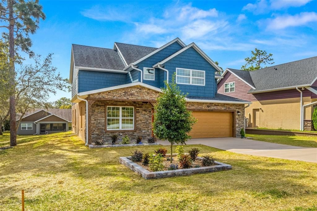 Attached, Exterior, Facade, Brick Facade, American Craftsman