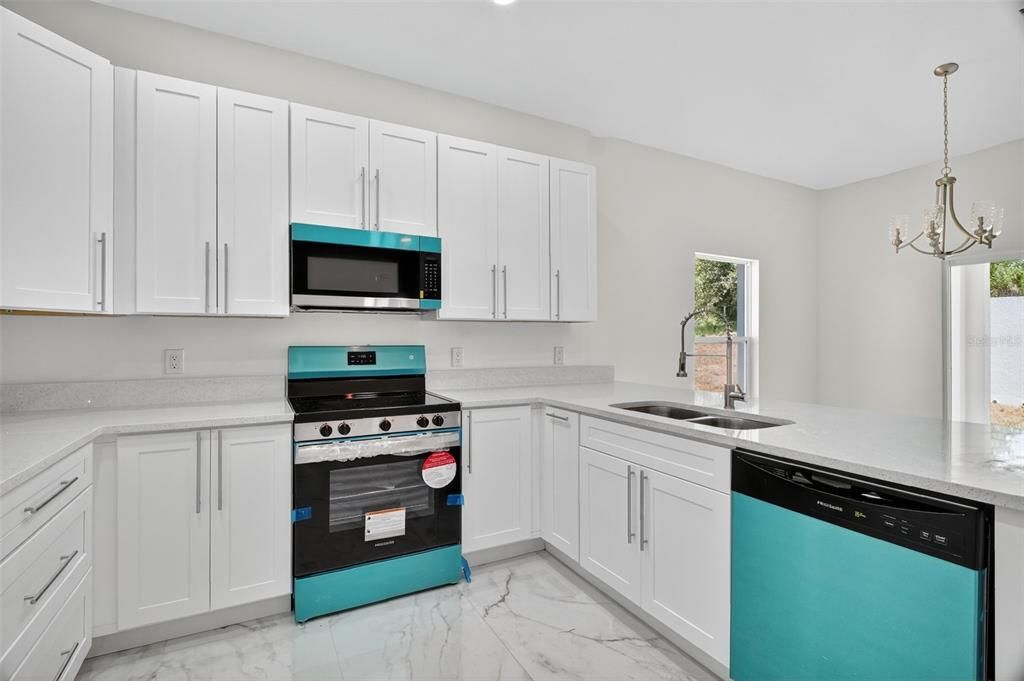 Chandelier, Interior, Kitchen, Marble, Pendant Lights, Recessed Lighting, Stainless Steel Appliances