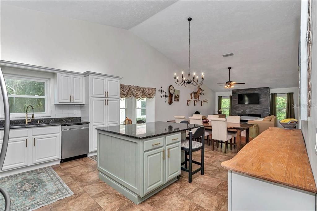 Chandelier, Dining room, Fireplace, Interior, Kitchen, Pendant Lights