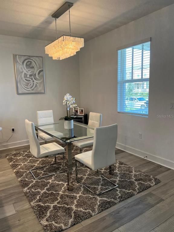 Chandelier, Dining room, Interior, Wood Texture Flooring